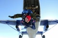 Skydiving. The moment of jumping out of an airplane.