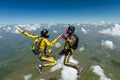 Skydiving photo. Extreme sport concept. Flying in a free fall. Royalty Free Stock Photo