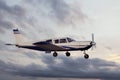 Skydiving plane flying in the sky, preparing the jump in free fall Royalty Free Stock Photo