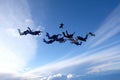 A group of skydivers. Skydiving in the amazing sky. Royalty Free Stock Photo