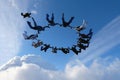 A group of skydivers. Skydiving in the amazing sky. Royalty Free Stock Photo