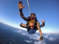 Skydiving tandem experience with student and instructor.