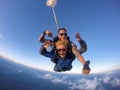 Skydiving tandem experience with student and instructor.