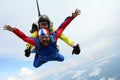 Skydiving. Tandem jump. Instructor and indian passenger. Royalty Free Stock Photo