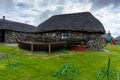 The Skye Museum of Island Life in Kilmuir on the coast of the Isle of Skye with thatched crofter cottages and boats