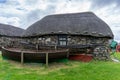 The Skye Museum of Island Life in Kilmuir on the coast of the Isle of Skye with thatched crofter cottages and boats