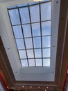 Skylight view installed in home with polished wood finishes Royalty Free Stock Photo