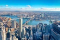 Skyline aerial view of Manhattan with skyscrapers, East River, Brooklyn Bridge and Manhattan Bridge - New York, USA Royalty Free Stock Photo
