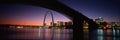 This is the skyline and Arch at sunset. Above it is the Eads Bridge along the Mississippi River Royalty Free Stock Photo