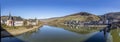 Skyline of Bernkastel-Kues with river Mosel and Cusanus Stift Royalty Free Stock Photo