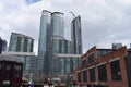 Skyline with big skyscrapers and ancient colorful trains in Toronto, Canada