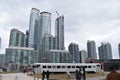 Skyline with big skyscrapers and ancient colorful trains in Toronto, Canada