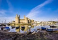 The skyline of Caernafon in Wales during low tide - United Kingdom