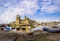 The skyline of Caernafon in Wales during low tide - United Kingdom