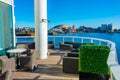 Skyline of Cardiff bay and Mermaid Quay behind a lounge in Wales Royalty Free Stock Photo