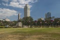 Skyline of Central Manila seen from Rizal Park Royalty Free Stock Photo