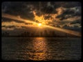 Skyline of Chicago as sun sets as seen from boat on Lake Michigan