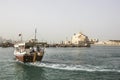 Skyline of Doha with traditional arabic dhows Royalty Free Stock Photo