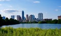 The skyline of downtown Austin Texas from the boardwalk on Lady Bird Lake