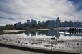 Skyline of the downtown and the symmetry reflection on the low tide lagoon. Vancouver BC Canada