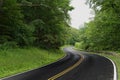 Skyline drive curving through the lush forest Royalty Free Stock Photo