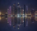 Skyline of Dubai Marina at a beautiful sunset with an infinity pool in front Royalty Free Stock Photo