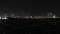 Beautiful night view of Dubai skyscrapers from the sea. skyline of Dubai Marina after sunset with a sea in the Royalty Free Stock Photo