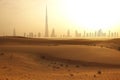 Skyline of Dubai at sunset or dusk, view from Arabian Desert