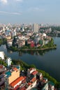 Skyline of Hanoi and Hoan kiem lake in Vietnam Asia late in the evening Royalty Free Stock Photo