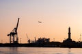 Skyline of harbor of Genoa during the sunset Royalty Free Stock Photo