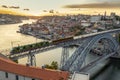 Skyline of the historic city of Porto with bridge by sunset, Portugal Royalty Free Stock Photo