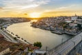 Skyline of the historic city of Porto with bridge by sunset, Portugal Royalty Free Stock Photo