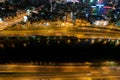 Skyline of Ho Chi Minh city by night with trails of lights, Vietnam