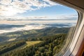 Skyline Horizon - Panoramic View from a Plane Window with Clouds and Fields Royalty Free Stock Photo