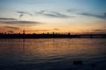 Skyline, Kiev city in the evening. The right bank at sunset across the Dnieper River. Silhouette of a city on a sunset