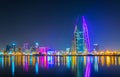 Skyline of Manama dominated by the World trade Center building during night, Bahrain....IMAGE Royalty Free Stock Photo