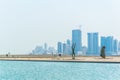 Skyline on Manama with sculptures of the National Museum in Manama, Bahrain....IMAGE