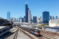 Skyline with METRA commuter rail train public transport near Union Station in Chicago, United States