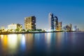 Skyline of Miami sunny isles by night with reflections in the water Royalty Free Stock Photo