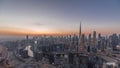 Skyline with modern architecture of Dubai business bay towers day to night timelapse. Aerial view Royalty Free Stock Photo