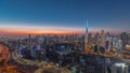 Skyline with modern architecture of Dubai business bay towers day to night timelapse. Aerial view Royalty Free Stock Photo