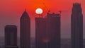 Skyline with modern architecture of Dubai business bay towers at sunset timelapse. Aerial view Royalty Free Stock Photo