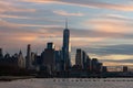 Skyline of the New York City Financial District along the Hudson River during a Sunset Royalty Free Stock Photo