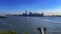 The skyline of New York (USA), seen from Liberty Island, where the Statue of Liberty is located. Royalty Free Stock Photo