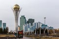 Skyline of Nur Sultan city with Baiterek Bayterek Tower and business district in autumn.