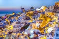 Skyline of Oia Town with Traditional White Architecture and Iconic Windmills Royalty Free Stock Photo