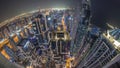 Skyline panorama of Dubai Marina showing canal surrounded by skyscrapers along shoreline all night timelapse. DUBAI, UAE Royalty Free Stock Photo