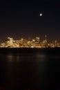 The skyline of San Francisco and moon at night Royalty Free Stock Photo