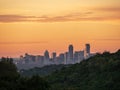 Skyline shot of Austin Texas downtown nestled between hills during vibrant golden sunrise Royalty Free Stock Photo