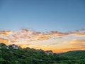 Skyline shot of Austin Texas downtown nestled between hills during vibrant golden sunrise Royalty Free Stock Photo